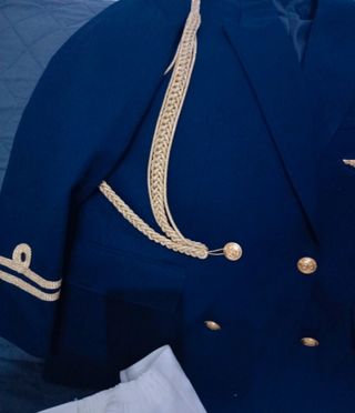 Traje de comunión niño azul y dorado