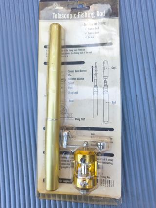 Caña de pescar telescópica dorada