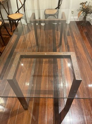 Mesa de comedor de cristal y hierro estilo industr