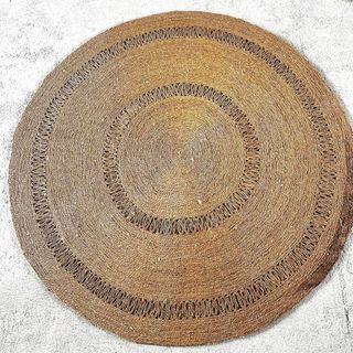 Alfombra redonda de yute beige y marrón