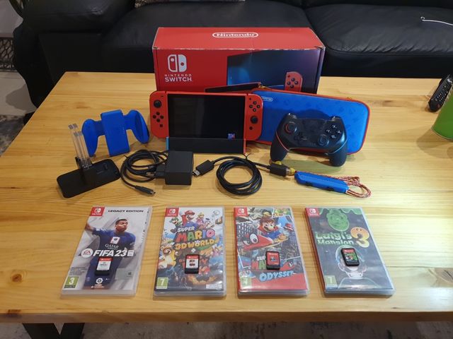 Nintendo Switch + 4 giochi + accessori