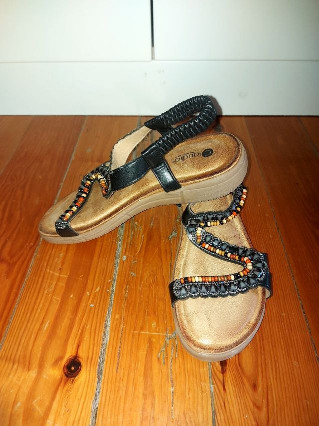 Sandalias planas negras