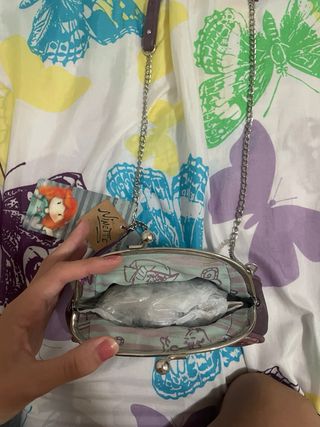 Bolso Ninete con cadena y etiqueta
