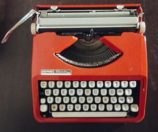Macchina da Scrivere Hermes Baby Arancione