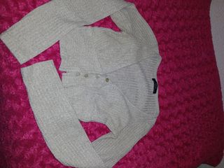 Torera de punto beige