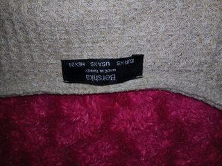 Torera de punto beige