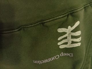 Sudadera verde con capucha