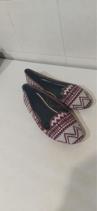 Bailarinas grises y multicolor