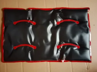 Almohada térmica roja de tela