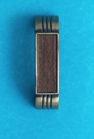 Tirador de mueble metal y madera