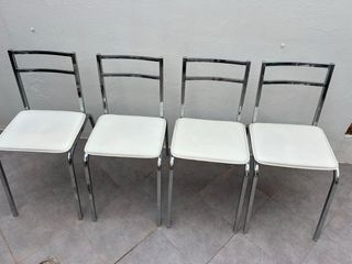 Mesa de cristal templado extensible y 4 sillas