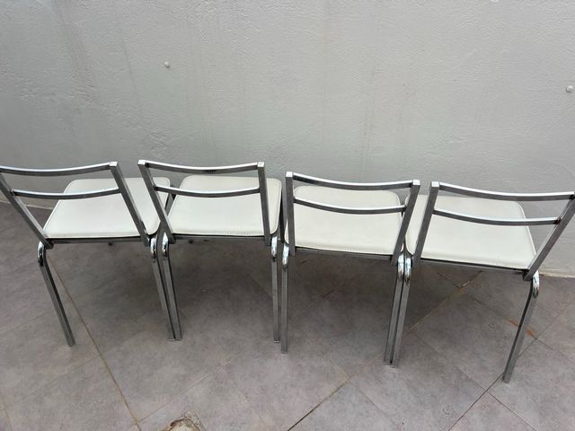 Mesa de cristal templado extensible y 4 sillas