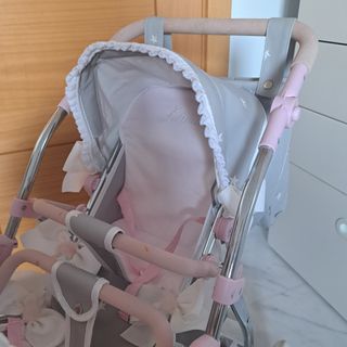 Carrito gemelar gris y rosa para muñecos.