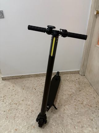 Patinete eléctrico para reparar batería