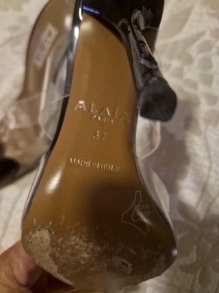 Tacones Alaïa Paris transparentes corazón negro