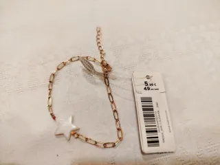 Bracciale Parfois stella madreperla oro, nuovo