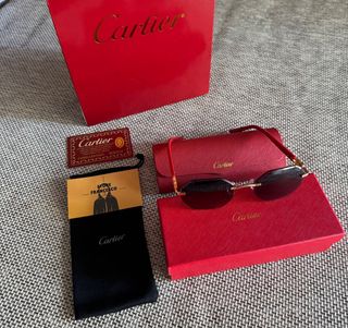 Occhiali da sole Cartier oro