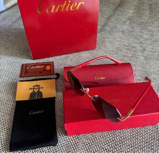 Occhiali da sole Cartier oro