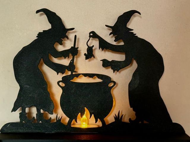 Silueta brujas caldero Halloween