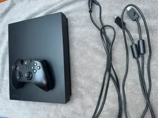 Xbox One X 1TB Negra con Mando y Cables
