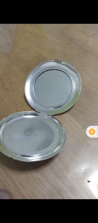 Polvera de plata antigua