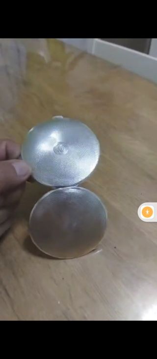 Polvera de plata antigua