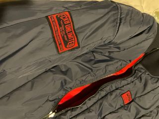 Cazadora bomber Ecko Unltd roja y azul
