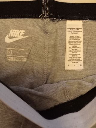 Mallas Nike grises con logo