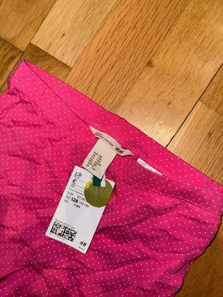 Mallas rosas lunares blancos.