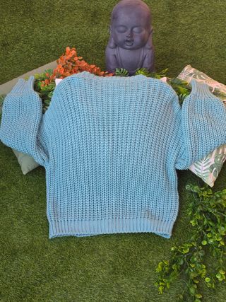 Chaqueta de punto verde con trenzas