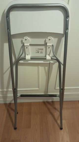 Taburete alto plegable metal y melamina.