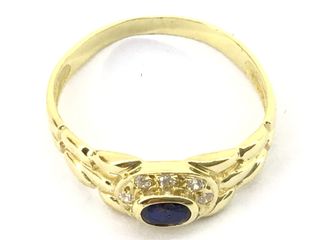 anillo oro 18k con piedra con circonita,zafiro