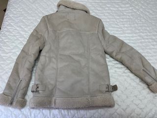 Abrigo piel vuelta beige