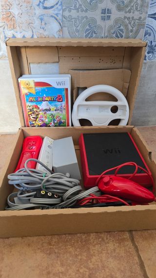 Nintendo Wii con Mario Party 8 y accesorios
