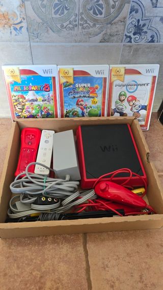 Nintendo Wii con Mario Party 8 y accesorios