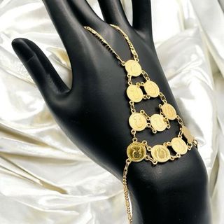 Pulsera manita 10 monedas de oro de 18k