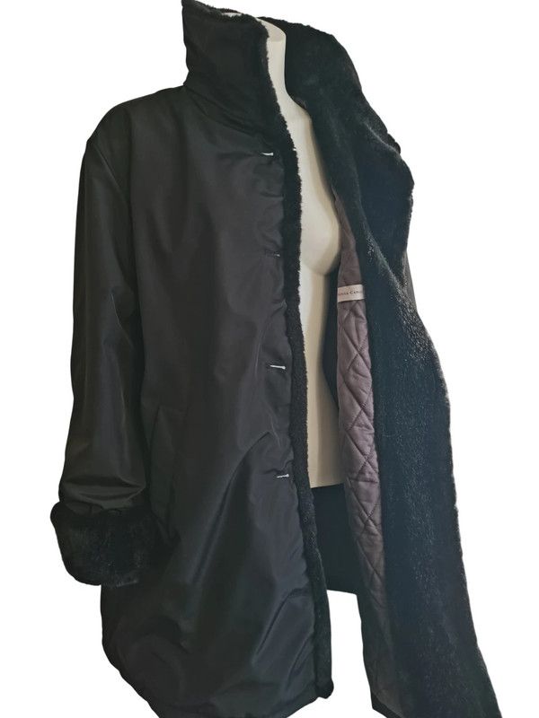 Cappotto imbottito ed antipioggia nero