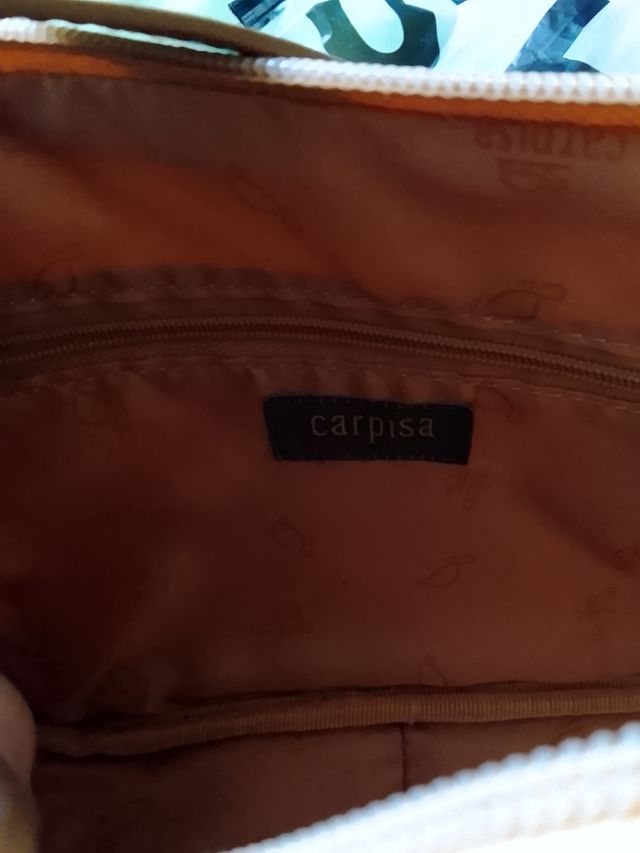 Key-way rosa SHEIN e borsetta CARPISA beige.