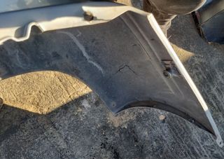 PARAGOLPES TRASERO TATA INDIGO 2005 GRIS