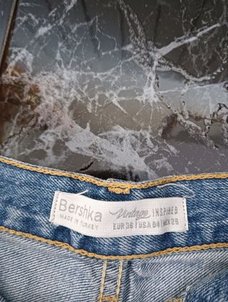 Tejano corto desgarrado