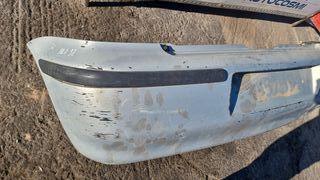 PARAGOLPES TRASERO VW POLO 1999 GRIS