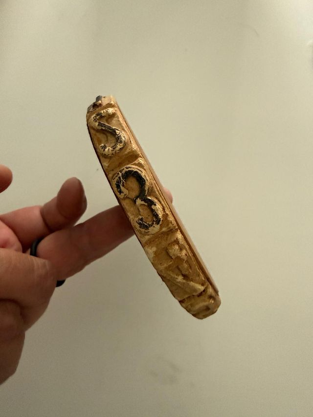 Rueda numeradora madera antigua