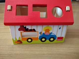 Casita de bloques de madera + alfombra de reg