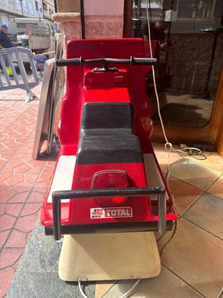 Atracción infantil moto de agua con monedero