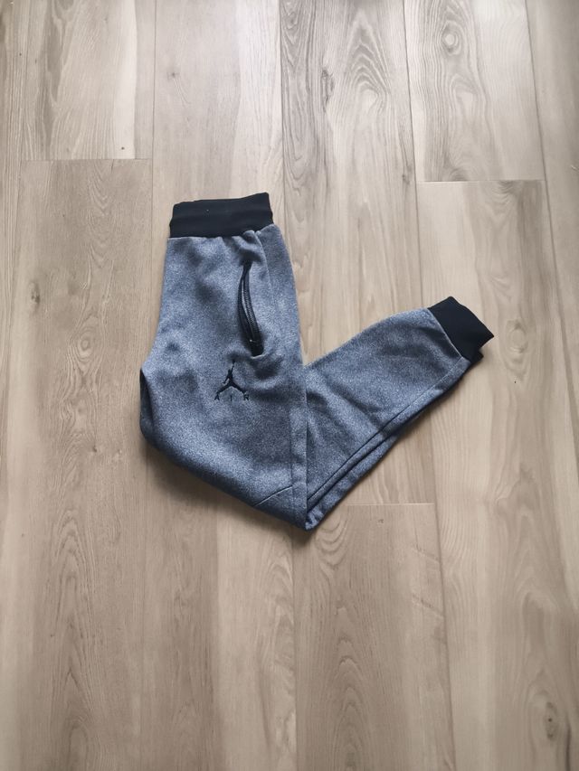 Pantalones Jordan grises con cremallera