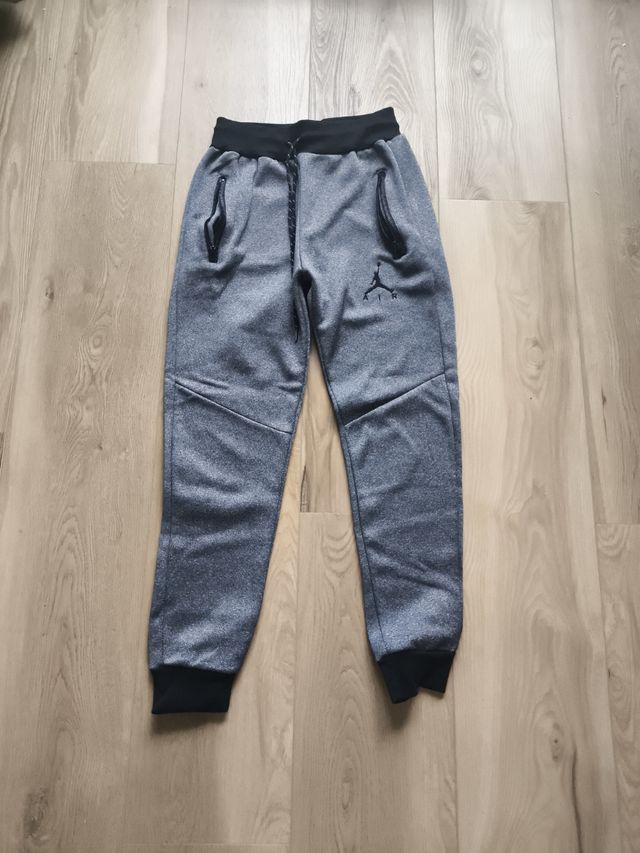 Pantalones Jordan grises con cremallera