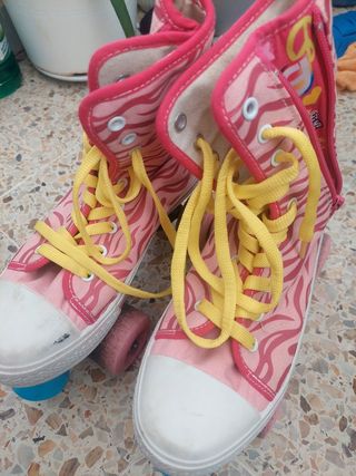 Patines de niña rosas con estampad, usado 2 veces 