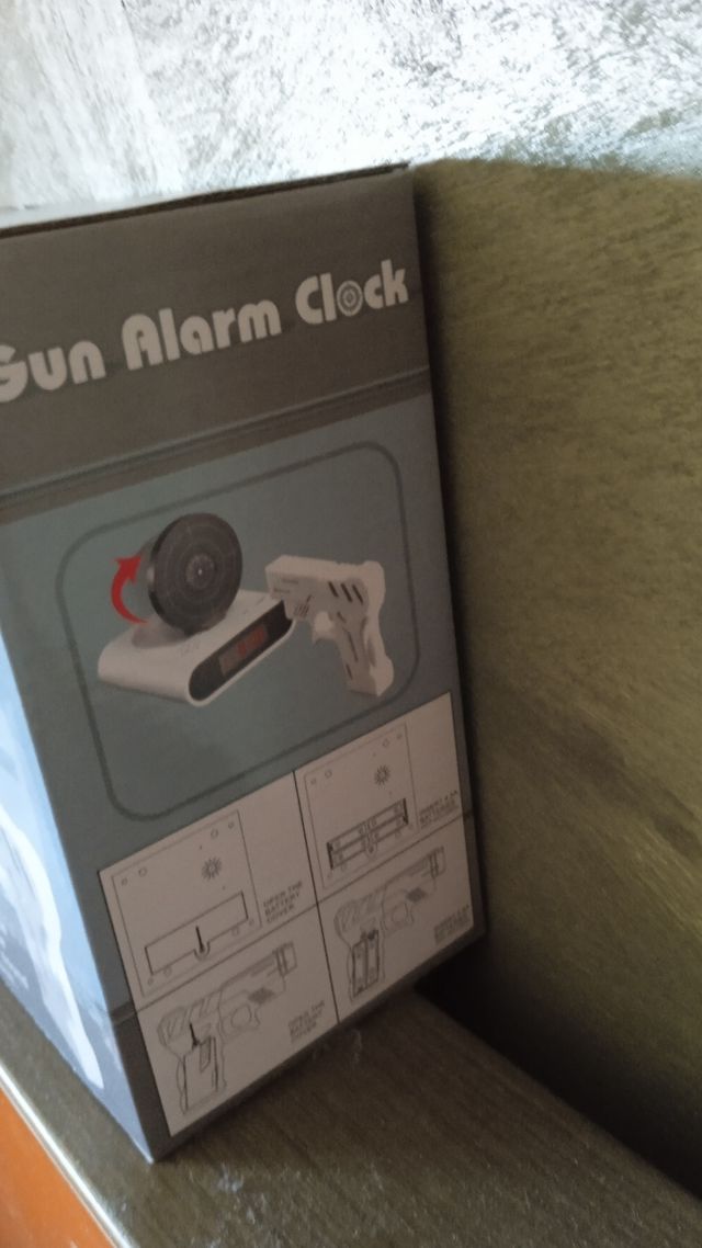 Radio Despertador Gun Alarm Clock