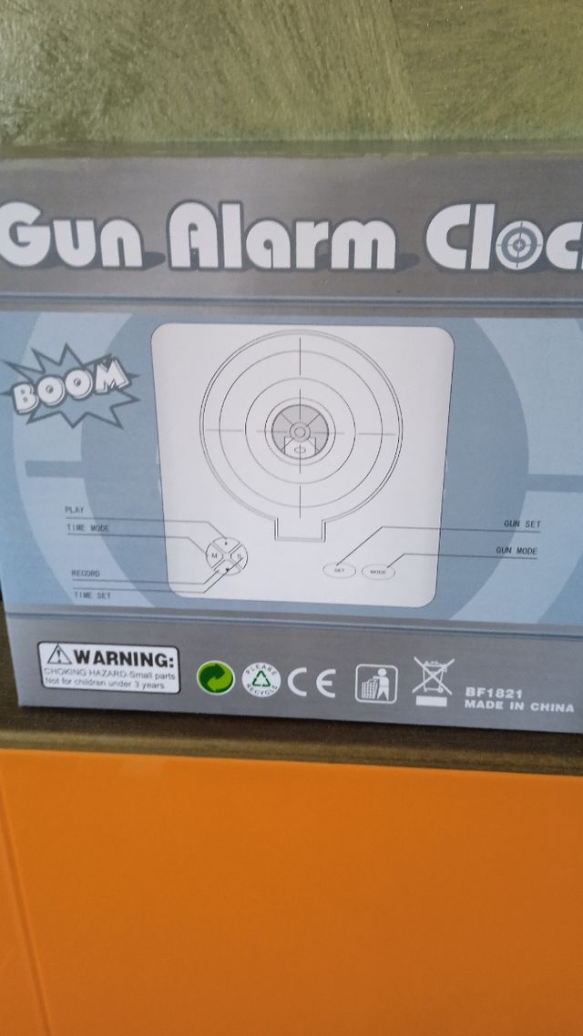 Radio Despertador Gun Alarm Clock