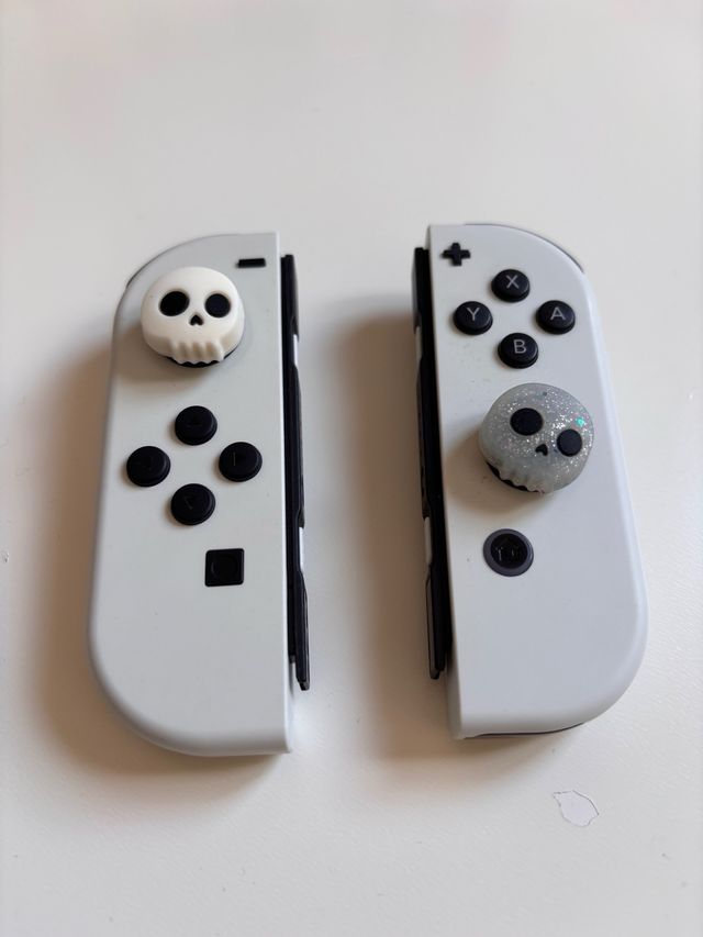 consola Nintendo Switch OLED blanca con juegos